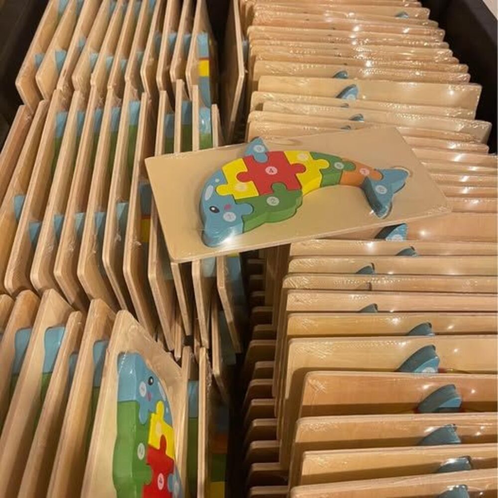 Lot of 140 of Wooden Dolphin Puzzles
